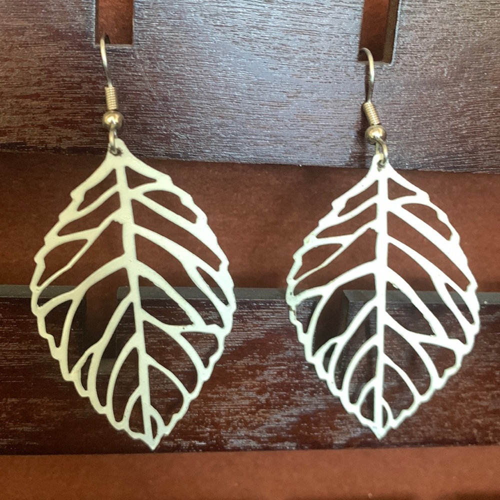White leaf shaped earrings